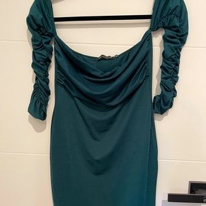 Emerald green ruched body con off the shoulder dress